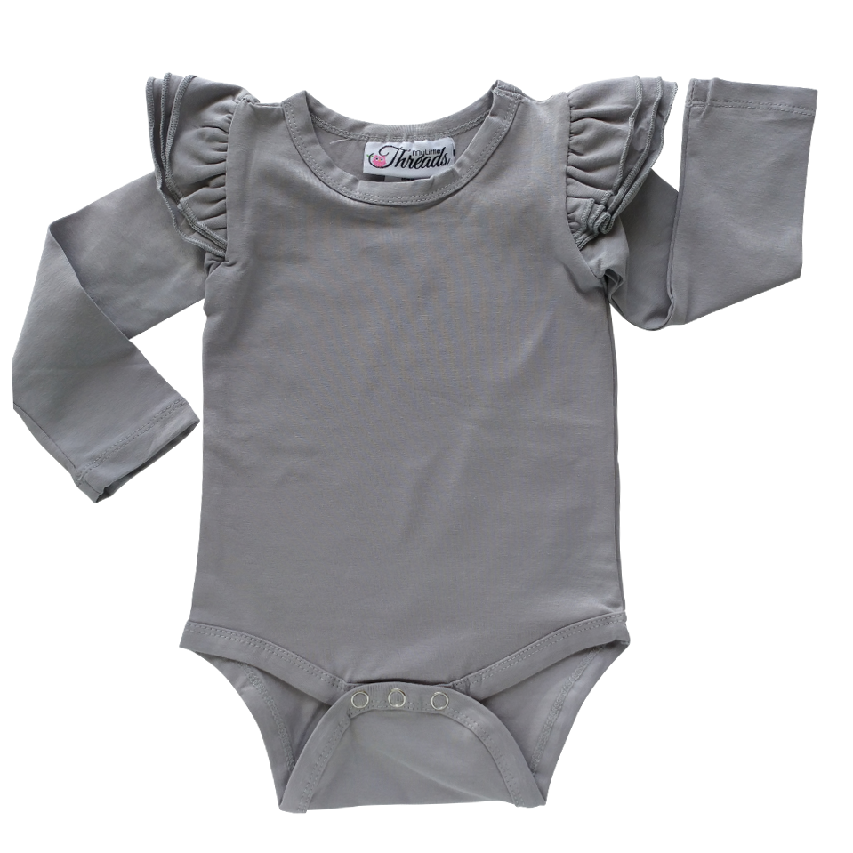 This Soft Grey Flutter Bodysuit / Onesie pairs wonderfully with our Skirts and Pinnys.The always popular long sleeve style is perfect for our Australian climate, protecting your little one's from the sun.  We've chosen a perfect blend of 95% cotton and 5% elastane because of it's durability, comfort and quality feel.